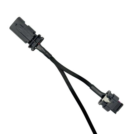 Black electrical connector with two wires on a white background